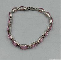 full view of bracelet on grey surface
