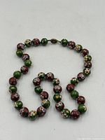 Entire necklace laid out to show overall length and bead pattern