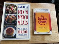 Front covers of both cookbooks