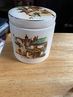 Sandland jam jar front view with cottage scene