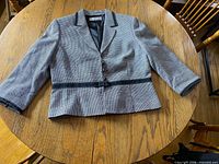 Tahari Arthur S. Levine blazer front view on table