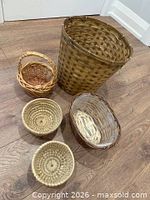 Five baskets grouped showing shapes and sizes