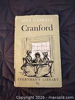 Front cover with dust jacket showing title, author as Mrs Gaskell, illustration, Everyman’s Library 83