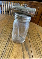 Full view of Electrolux glass spray bottle on table