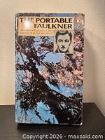 Front cover showing title, author image, publisher logo