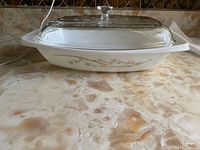 Side view of casserole with lid showing pattern