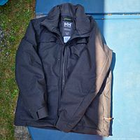 Front view of Helly Hansen dark grey jacket
