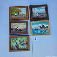 Group shot of all five framed paintings