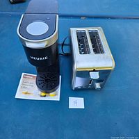 Front view of Keurig coffee maker and toaster together