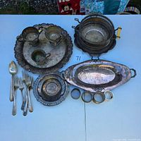 overview of all silverplate items on table