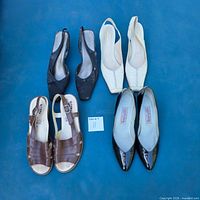 All four pairs of shoes laid out