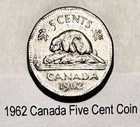 Reverse side showing beaver design, legends CANADA 1962, 12-sided edge