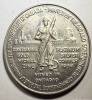 Obverse showing mining worker, factory, metal composition legends