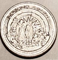 Reverse showing explorers on sled with huskies and legends