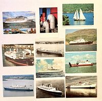Fronts of all eleven ship postcards laid out