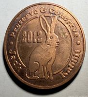 Obverse of copper medallion with jack rabbit and 2012 date