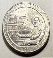 Reverse of 2017 Frederick Douglass quarter showing Cedar Hill and seated Douglass