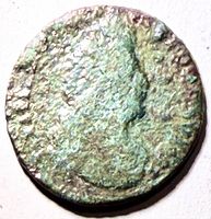 Obverse side of worn copper Liard coin