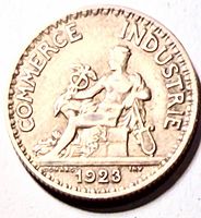 Obverse of 1923 token showing seated Mercury, inscriptions and date