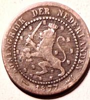 Obverse of 1877 Netherlands 1 cent showing crowned lion, legend, date and privy marks