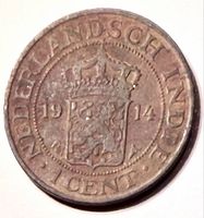 Obverse showing shield with Dutch lion, date 1914, inscriptions and mintmarks