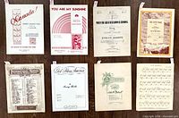 Group view of all eight sheet music covers laid out in two rows