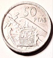 Reverse showing 50 PTAS, eagle, shield, star date position