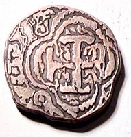 Obverse showing cross design and monogram detail