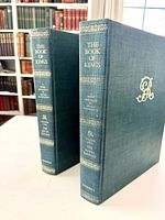 Both hardcover volumes standing, showing spine titles and matching bindings