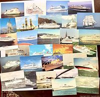 all 30 boat-themed postcards laid out