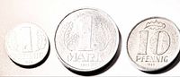 Obverse sides displaying denominations 1 Pfennig, 1 Mark, 10 Pfennig