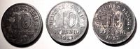 Reverse sides of all three coins showing dates 1917 and 1921 with denomination