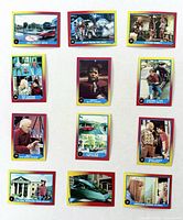 Overview of all twelve trading cards laid out in three columns