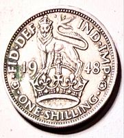 Reverse crowned lion design with legends and date 1948