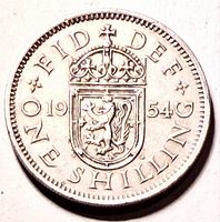 Reverse showing crowned lion, date 1954, denomination ONE SHILLING