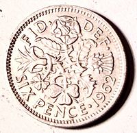Reverse showing floral emblems and date 1962