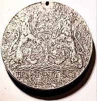 Reverse of token with crown, lions, dates and legend