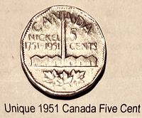 Reverse of 1951 Canada five-cent coin showing refinery design and inscriptions