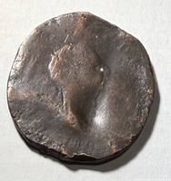 Obverse of coin showing worn bust outline, rim nicks