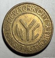 Obverse showing NEW YORK CITY TRANSIT AUTHORITY text and NYC monogram