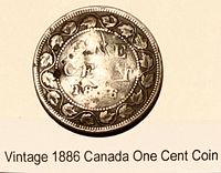 Reverse side showing ONE CENT 1886 within maple leaf vine