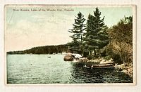 Front of postcard showing lakefront scene and caption
