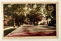 Front view of postcard showing Ontario Street scene and caption