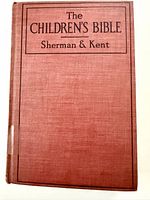Front cover showing red cloth binding and title