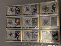Nine cards in binder page showing players Maurice Richard through Jean Beliveau