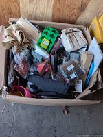 overhead view of box showing variety of packaged items