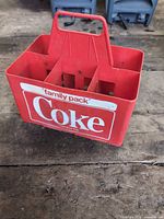Front view showing Coke logo and six compartments