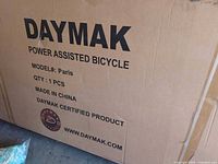 Daymak marked carton showing model information