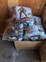 Closed box with multiple sealed Marvel Ant-Man Yellowjacket costumes visible