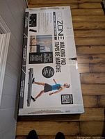 Sealed retail box showing GoZone Walking Pad graphics and specifications